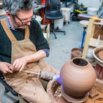 Doug Fitch and Hannah McAndrew making a jug for me